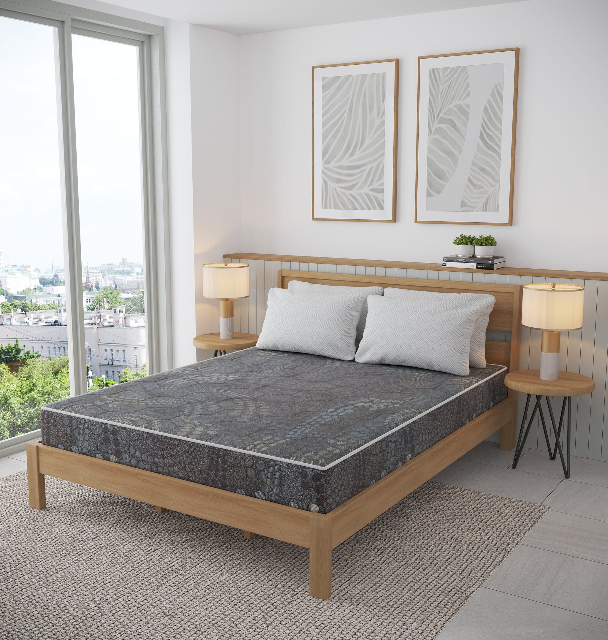 Solid oak platform bed with a patterned quilted grey coverlet and textured pillows, against a sage panelled wall with oak side tables and a city view through corner glazing