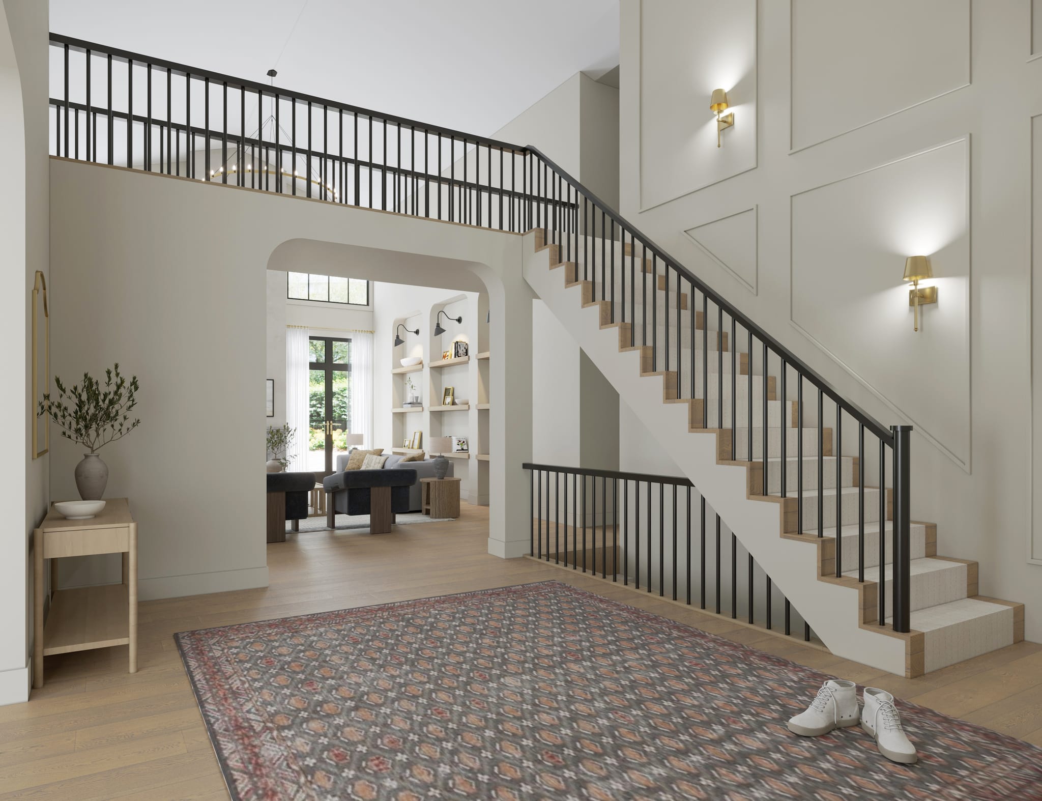 Alternate stair view showing the upper gallery landing, balustrade run and brass sconces against panelled walls